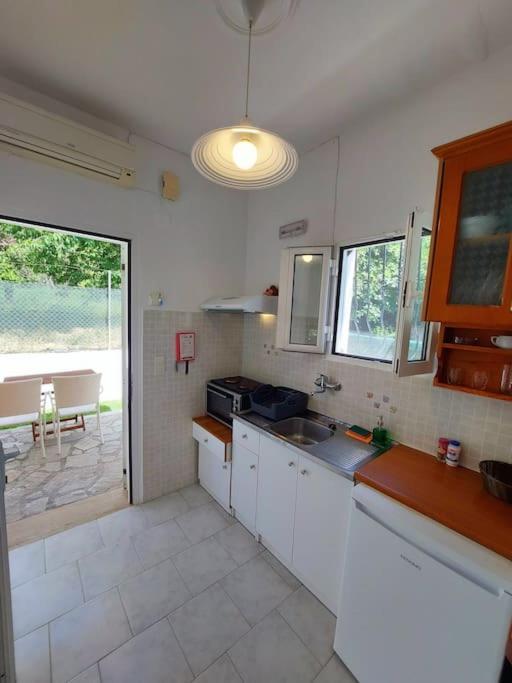 Villa Eleni อากิออส กอร์ดิออส ภายนอก รูปภาพ